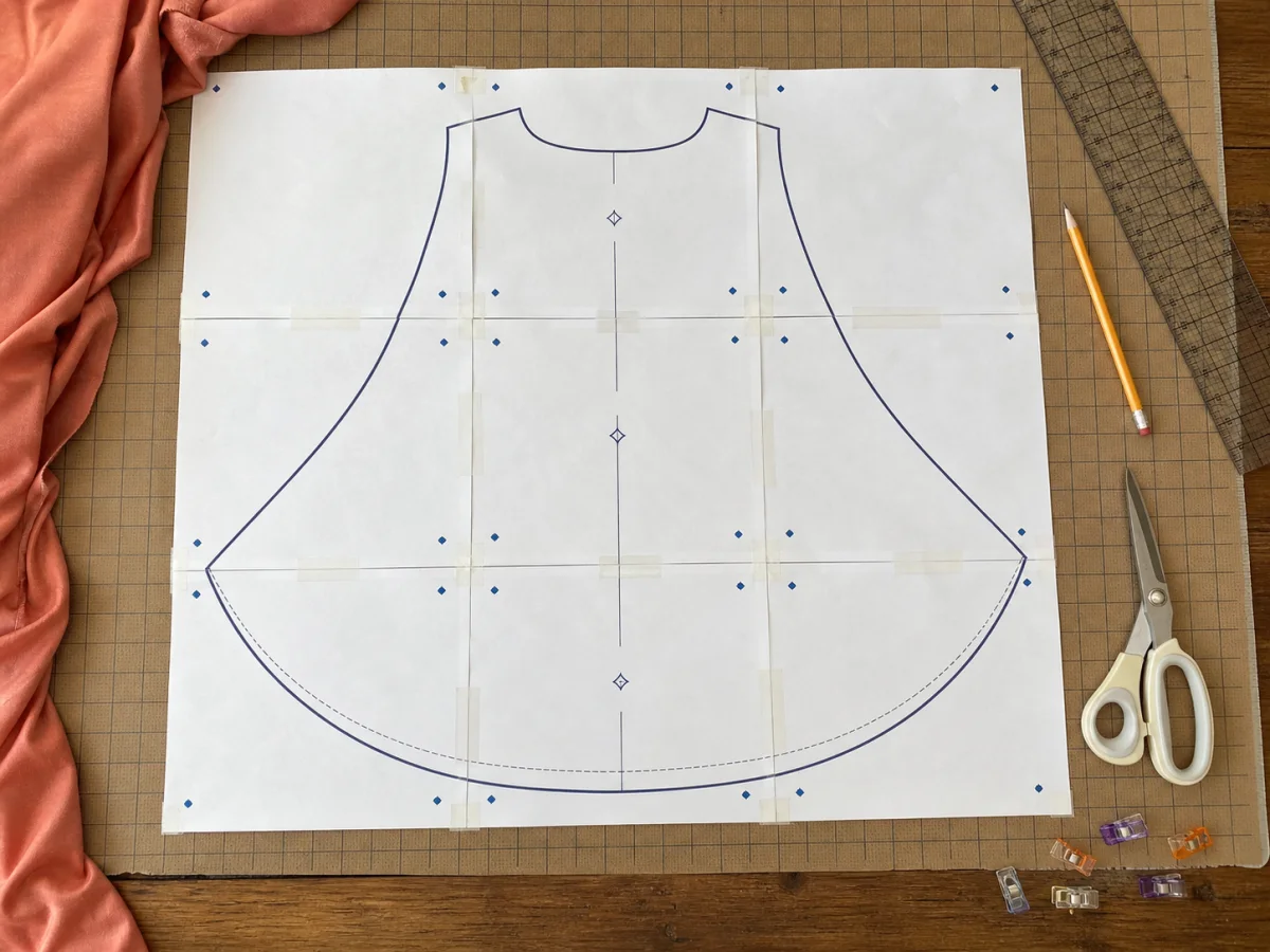 A full-size sewing pattern assembled from tiled sheets